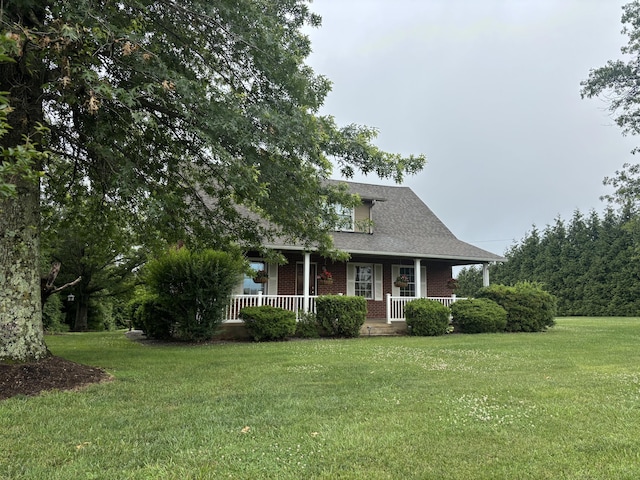 120 Nyle Ridge Rd, Wirtz, VA 24184 - view of front of home with covered porch, a front lawn, and brick siding