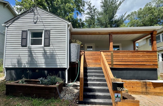 1129 Kerns Ave SW, Roanoke, VA 24015 - view of front of house with covered porch and stairway