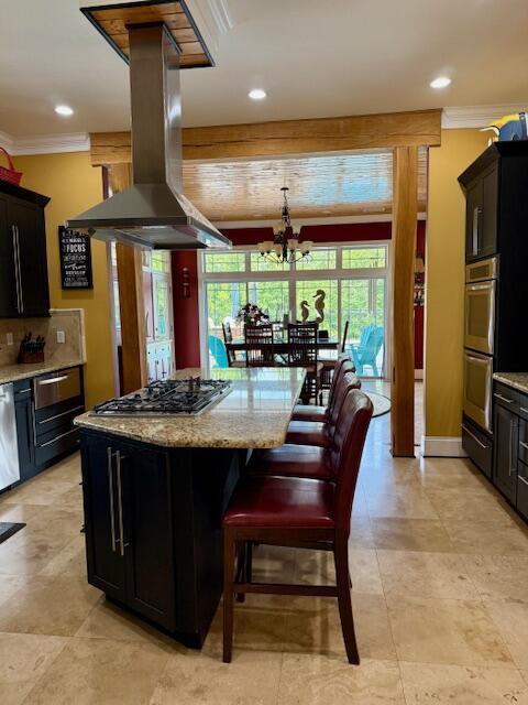 1038 Lees Mill Ln, Goode, VA 24556 - kitchen with appliances with stainless steel finishes, island range hood, ornamental molding, light stone counters, and recessed lighting