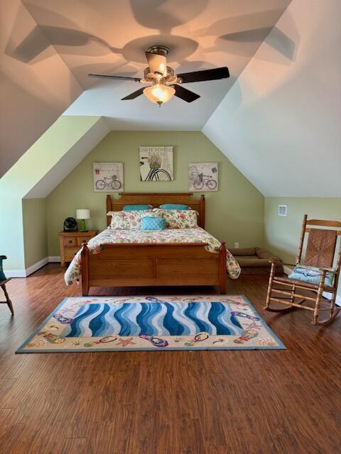 1038 Lees Mill Ln, Goode, VA 24556 - bedroom featuring wood finished floors, lofted ceiling, and ceiling fan