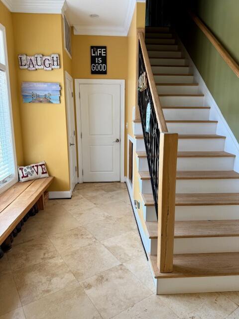 1038 Lees Mill Ln, Goode, VA 24556 - stairway featuring ornamental molding, healthy amount of natural light, and baseboards