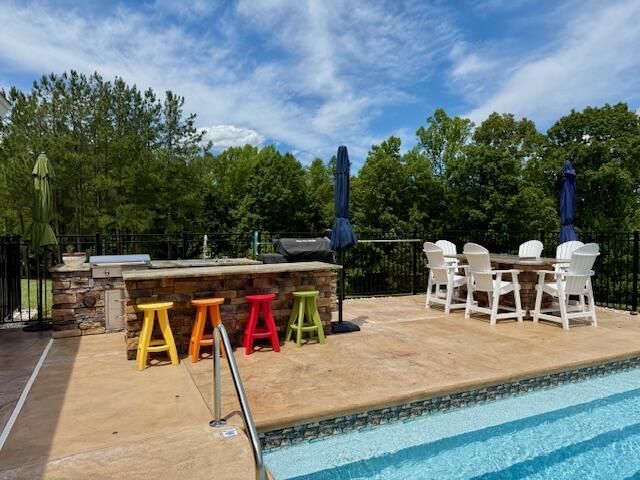 1038 Lees Mill Ln, Goode, VA 24556 - view of swimming pool featuring a patio