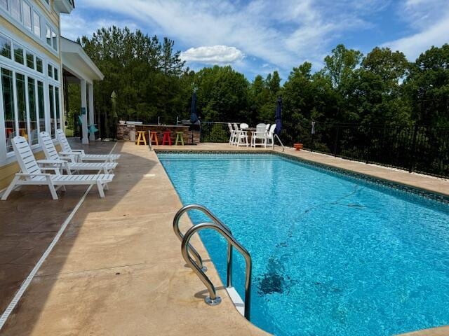 1038 Lees Mill Ln, Goode, VA 24556 - swimming pool featuring a patio area