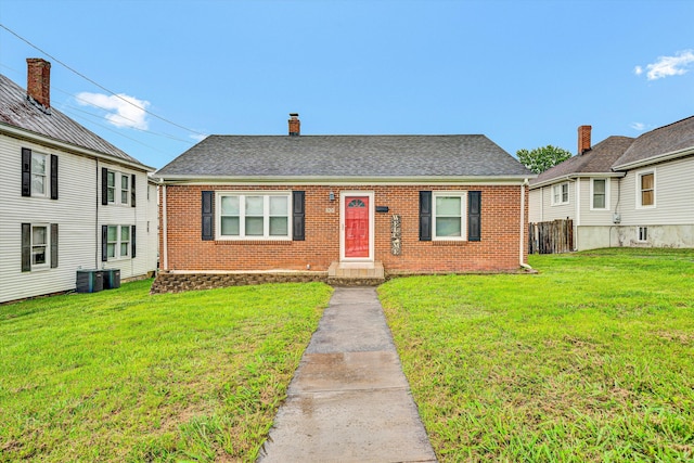 130 W Augusta Ave, Vinton, VA 24179 - bungalow with brick siding, a chimney, and a shingled roof