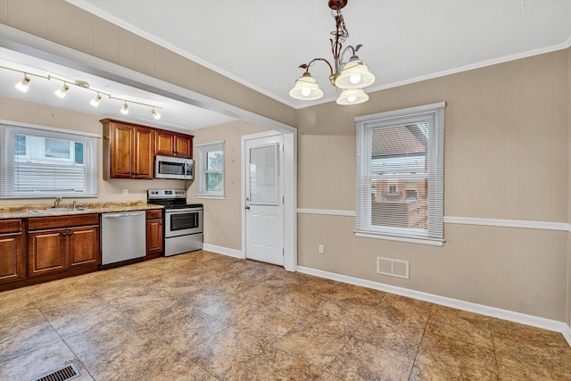 130 W Augusta Ave, Vinton, VA 24179 - kitchen featuring stainless steel appliances, a sink, a chandelier, healthy amount of natural light, and ornamental molding
