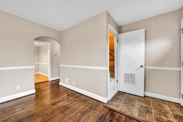 130 W Augusta Ave, Vinton, VA 24179 - unfurnished room with arched walkways and baseboards