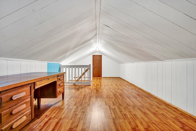 130 W Augusta Ave, Vinton, VA 24179 - additional living space featuring wood-type flooring, vaulted ceiling, a desk, and wooden walls