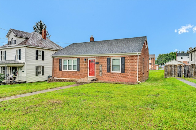 130 W Augusta Ave, Vinton, VA 24179 - view of front of house with brick siding, a shingled roof, and a chimney