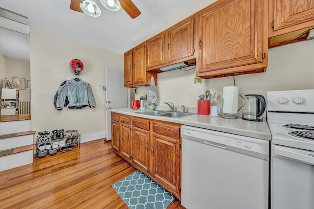 602 Allison Ave SW, Roanoke, VA 24016 - kitchen with white appliances, ceiling fan, light countertops, a sink, and light wood-style floors