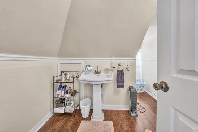 602 Allison Ave SW, Roanoke, VA 24016 - bathroom with wood finished floors and lofted ceiling