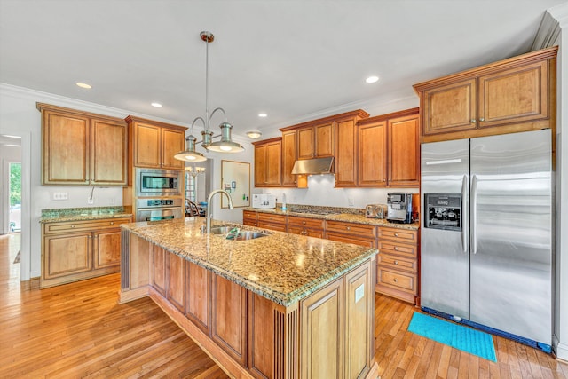1160 Belcroft Ct, Roanoke, VA 24018 - kitchen featuring stainless steel appliances, brown cabinets, a center island with sink, light wood-type flooring, and light stone counters