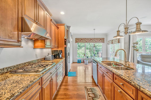 1160 Belcroft Ct, Roanoke, VA 24018 - kitchen with under cabinet range hood, appliances with stainless steel finishes, brown cabinets, light wood-style flooring, and light stone countertops