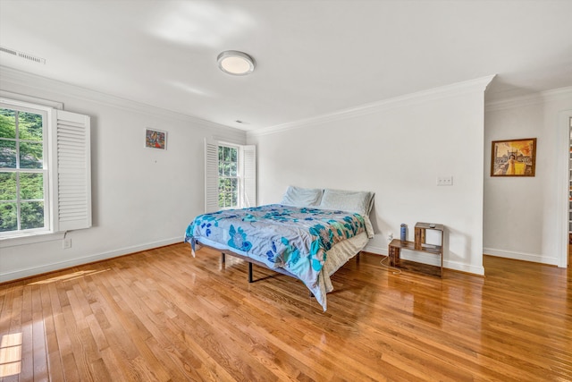 1160 Belcroft Ct, Roanoke, VA 24018 - bedroom with ornamental molding, multiple windows, and light wood-type flooring