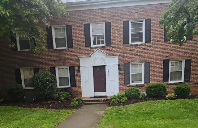 2415 Longview Ave SW Unit 1, Roanoke, VA 24014 - view of front of house featuring brick siding and a front yard