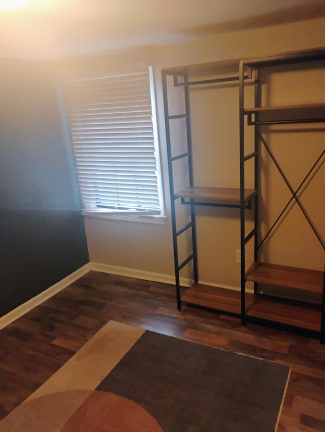 2415 Longview Ave SW Unit 1, Roanoke, VA 24014 - unfurnished bedroom featuring wood finished floors and baseboards