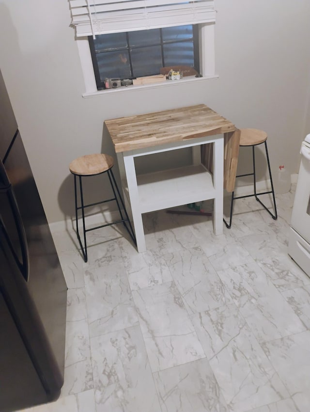 2415 Longview Ave SW Unit 1, Roanoke, VA 24014 - dining space featuring light marble finish floors and baseboards
