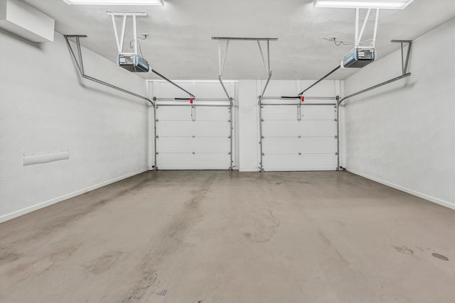 3303 Belshire Ct SW, Roanoke, VA 24014 - garage with a garage door opener and baseboards