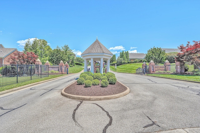 3303 Belshire Ct SW, Roanoke, VA 24014 - view of asphalt street featuring curbs and a gated entry