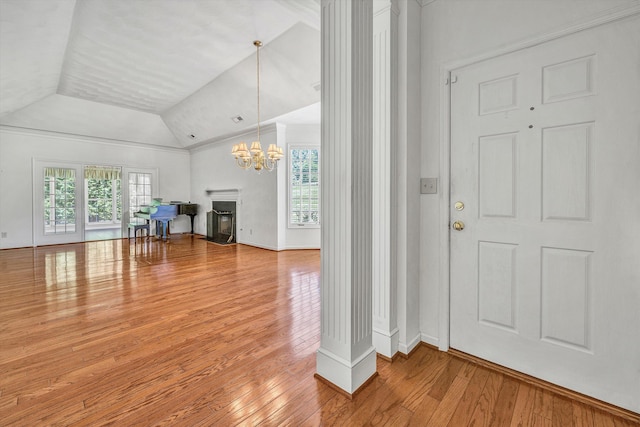 3303 Belshire Ct SW, Roanoke, VA 24014 - entrance foyer with healthy amount of natural light, lofted ceiling, hardwood / wood-style flooring, a chandelier, and a fireplace