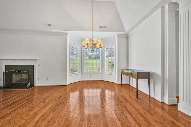 3303 Belshire Ct SW, Roanoke, VA 24014 - unfurnished living room with a chandelier, lofted ceiling, wood finished floors, a tile fireplace, and ornamental molding