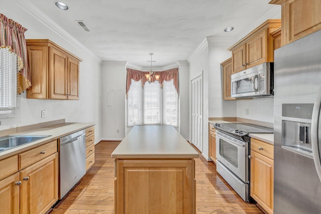 3303 Belshire Ct SW, Roanoke, VA 24014 - kitchen featuring stainless steel appliances, a center island, a chandelier, light wood finished floors, and recessed lighting
