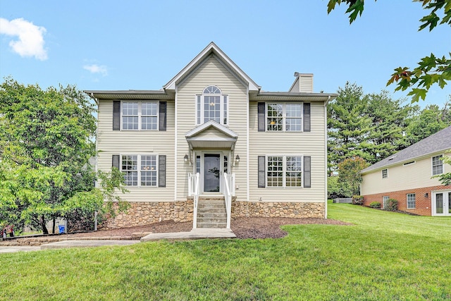 135 Sapphire Ave, Christiansburg, VA 24073 - view of front of home featuring a chimney and a front lawn