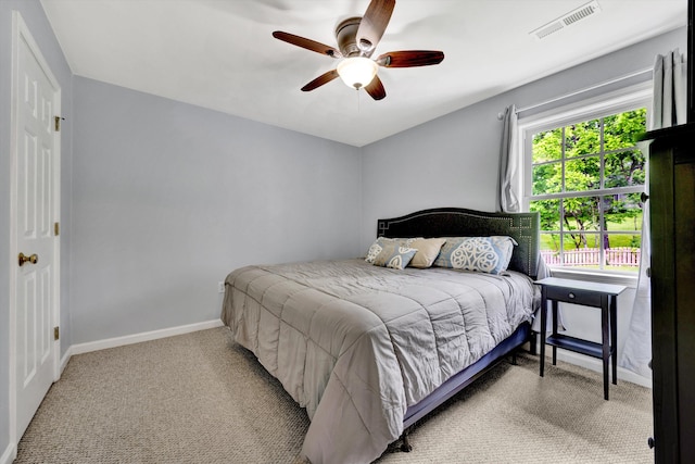 135 Sapphire Ave, Christiansburg, VA 24073 - bedroom with light colored carpet, baseboards, and a ceiling fan