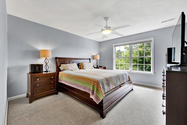 135 Sapphire Ave, Christiansburg, VA 24073 - bedroom featuring baseboards, light colored carpet, and a ceiling fan