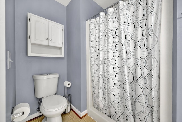 135 Sapphire Ave, Christiansburg, VA 24073 - bathroom featuring toilet, baseboards, a shower with shower curtain, and tile patterned flooring