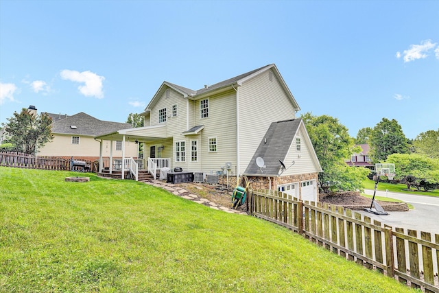 135 Sapphire Ave, Christiansburg, VA 24073 - rear view of house with an attached garage and driveway