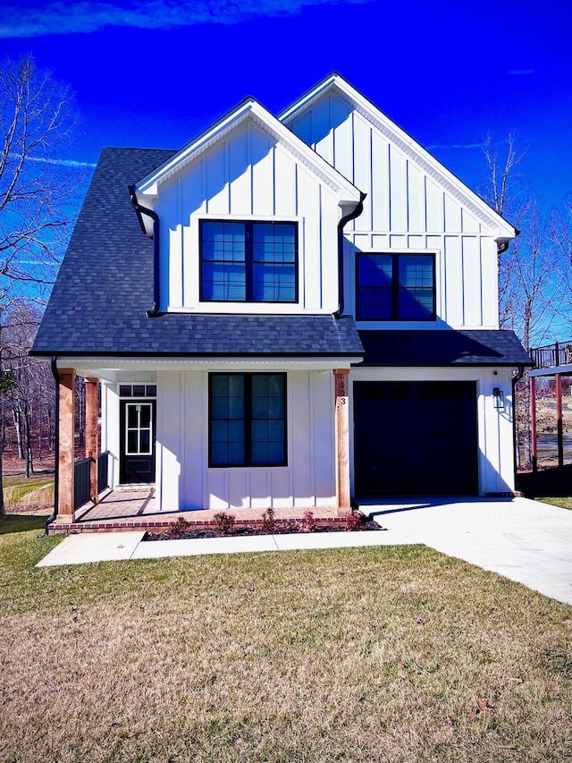 103 Retreat Ln, Huddleston, VA 24104 - view of front of house featuring board and batten siding, roof with shingles, a garage, and covered porch