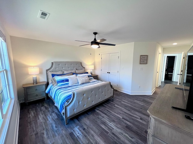 103 Retreat Ln, Huddleston, VA 24104 - bedroom featuring dark wood-style flooring, baseboards, a closet, and ceiling fan