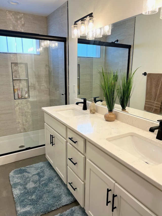 103 Retreat Ln, Huddleston, VA 24104 - bathroom with plenty of natural light, double vanity, a stall shower, and tile patterned floors