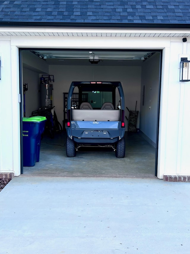 103 Retreat Ln, Huddleston, VA 24104 - garage featuring concrete driveway and a garage door opener
