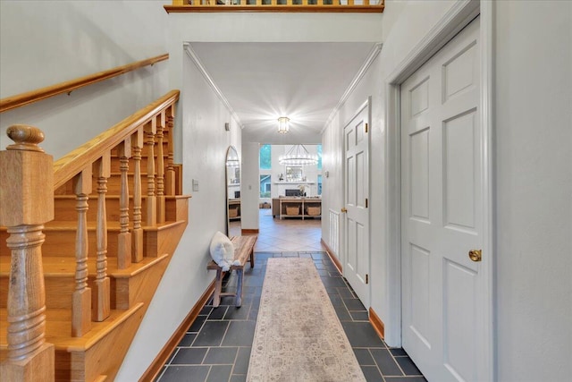 20728 Virgil H Goode Hwy, Rocky Mount, VA 24151 - hallway featuring stairs, crown molding, baseboards, a chandelier, and dark tile patterned floors