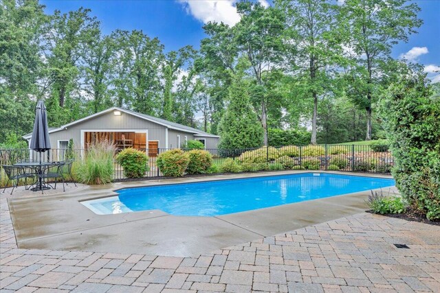 20728 Virgil H Goode Hwy, Rocky Mount, VA 24151 - view of swimming pool featuring a patio area and view of scattered trees