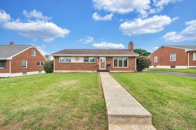 214 Preston Ave NE, Roanoke, VA 24012 - view of front facade with a front lawn, brick siding, and a chimney