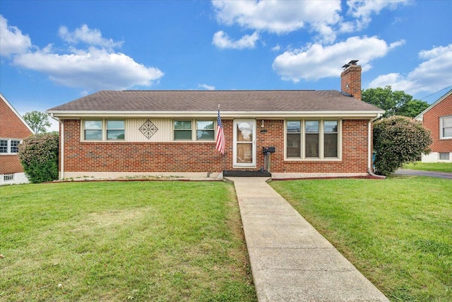 214 Preston Ave NE, Roanoke, VA 24012 - view of front of house featuring brick siding, a front yard, a chimney, and roof with shingles