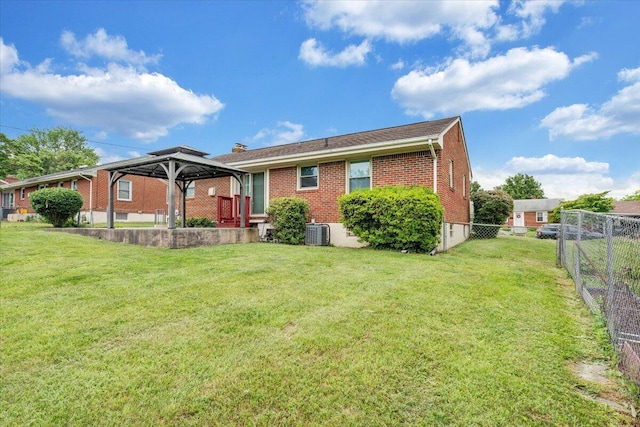 214 Preston Ave NE, Roanoke, VA 24012 - rear view of house featuring a gazebo, brick siding, central air condition unit, and a chimney
