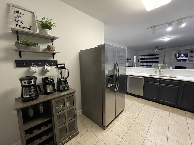 1175 Mariners Way Unit 58, Huddleston, VA 24104 - kitchen with stainless steel appliances, a sink, light tile patterned flooring, and open shelves