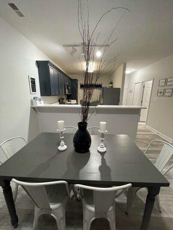 1175 Mariners Way Unit 58, Huddleston, VA 24104 - dining area featuring light wood-type flooring and baseboards