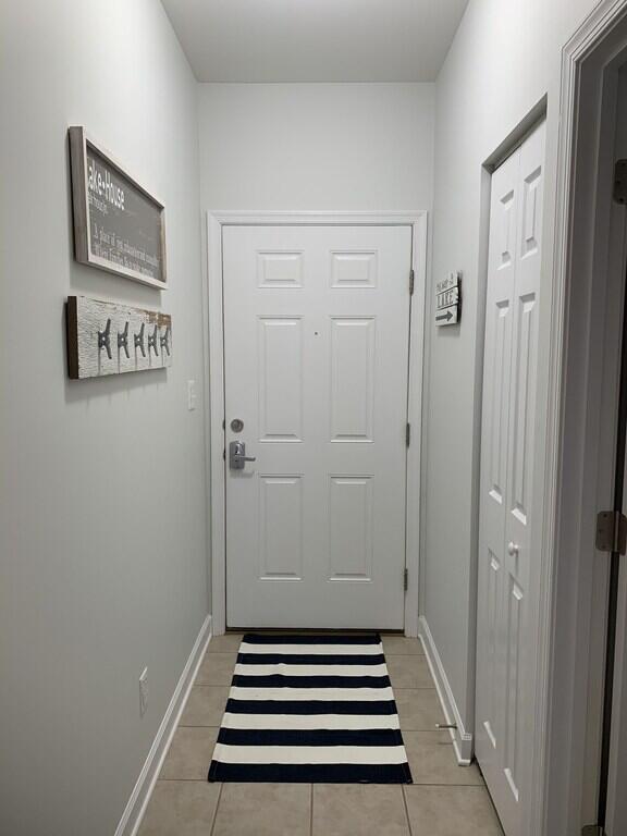 1175 Mariners Way Unit 58, Huddleston, VA 24104 - doorway featuring light tile patterned floors and baseboards