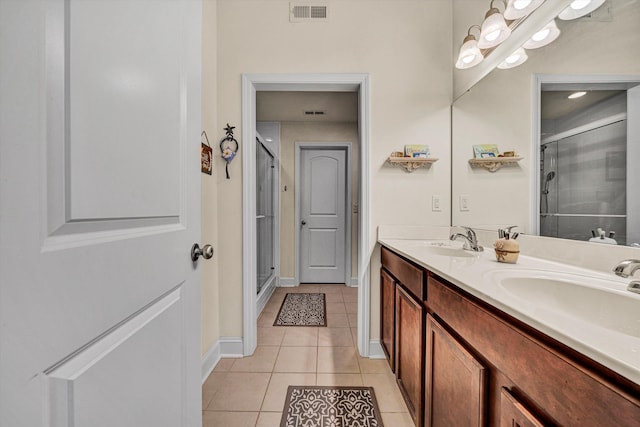 4210 Hannah Belle Way, Roanoke, VA 24018 - full bathroom with tile patterned flooring, a shower stall, double vanity, and baseboards