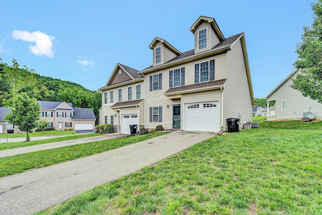 4210 Hannah Belle Way, Roanoke, VA 24018 - view of front facade featuring asphalt driveway, an attached garage, a front yard, and a residential view