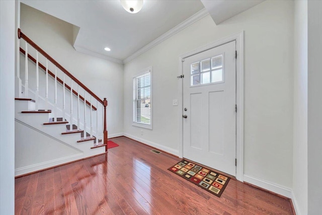 7019 Linn Cove Ct, Roanoke, VA 24018 - foyer entrance featuring ornamental molding, stairs, wood finished floors, and baseboards