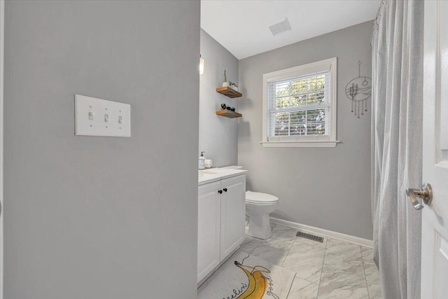 828 Ray St, Roanoke, VA 24019 - bathroom featuring marble finish floors, vanity, toilet, baseboards, and a shower with shower curtain