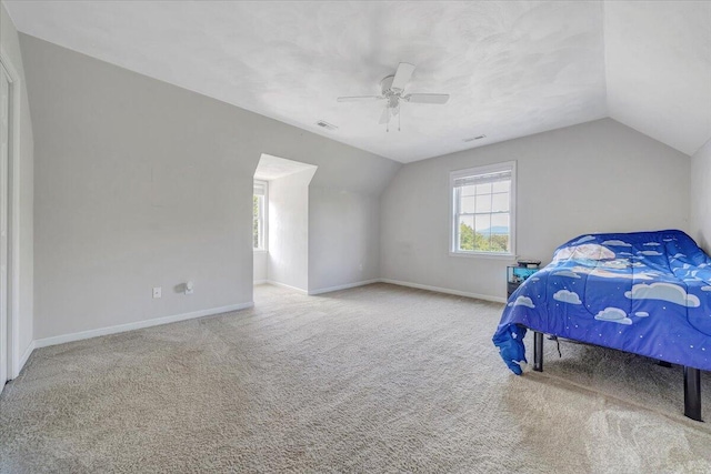 828 Ray St, Roanoke, VA 24019 - bedroom with vaulted ceiling, carpet flooring, baseboards, and ceiling fan