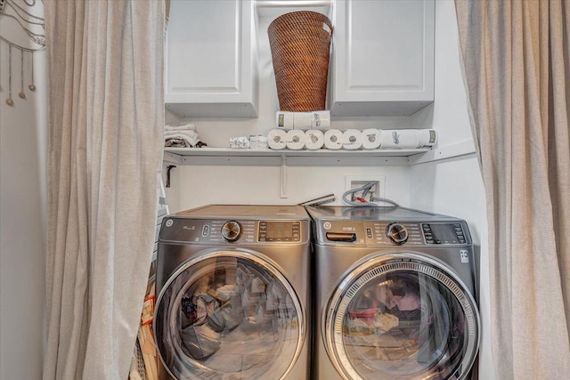 828 Ray St, Roanoke, VA 24019 - laundry room featuring cabinet space and independent washer and dryer
