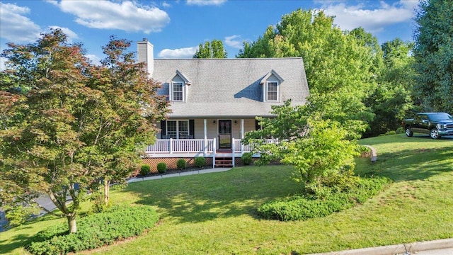 828 Ray St, Roanoke, VA 24019 - cape cod home featuring a porch, a front lawn, and a chimney