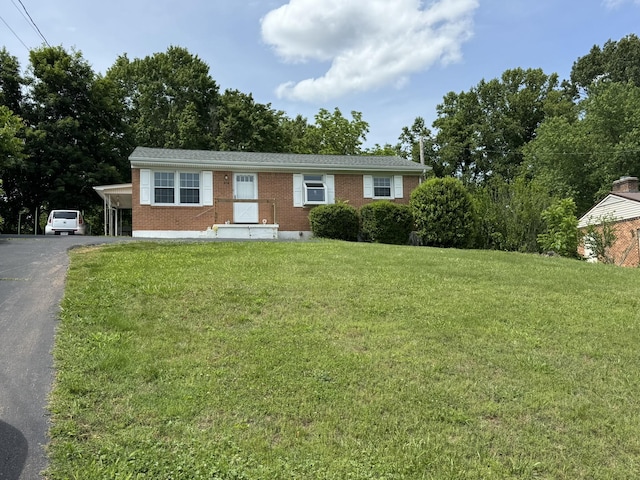 570 Scuffling Hill Rd, Rocky Mount, VA 24151 - single story home featuring brick siding, asphalt driveway, and a front yard